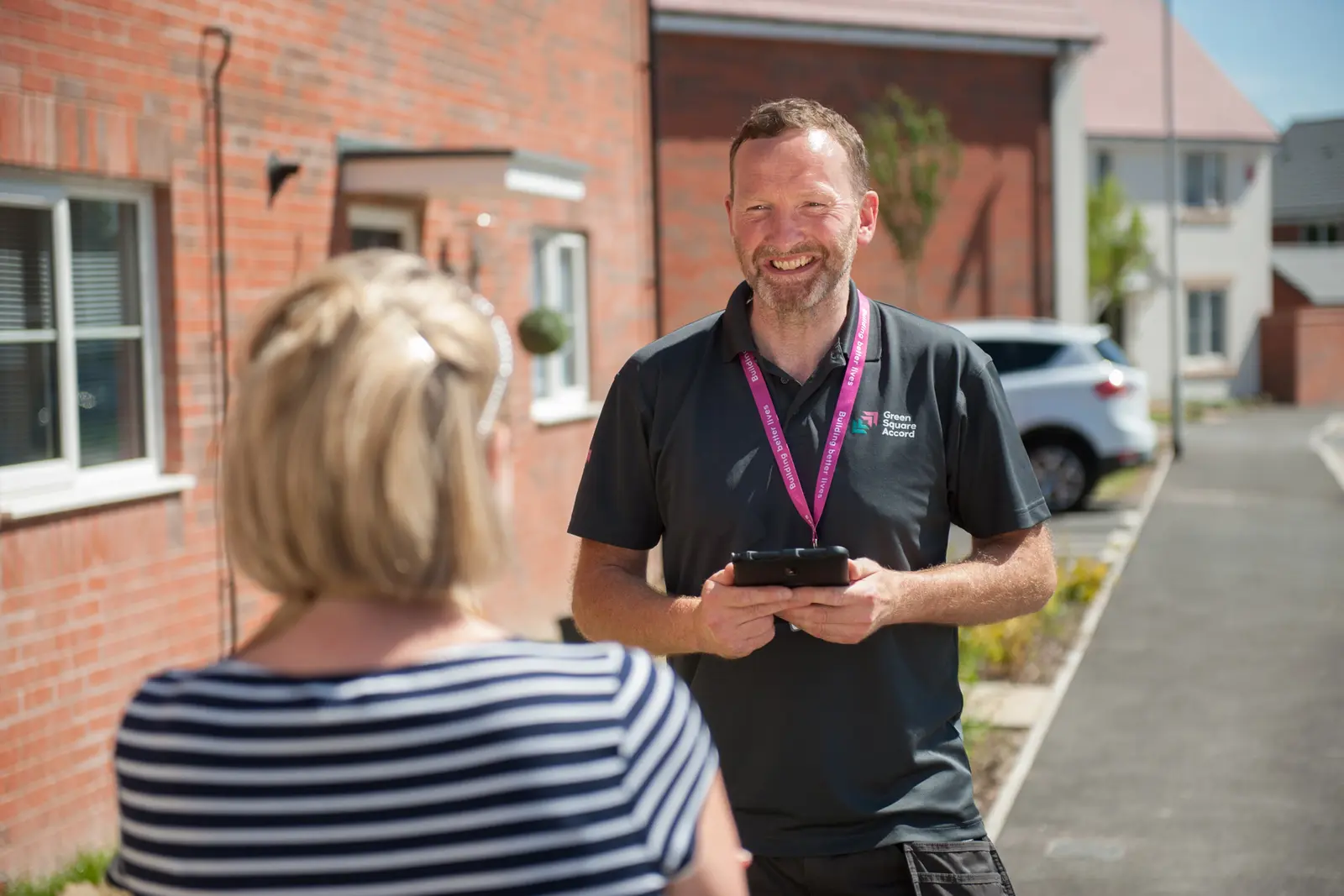 A GreenSquareAccord colleague talking to a customer